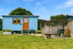 Shepherd's hut and outdoor area