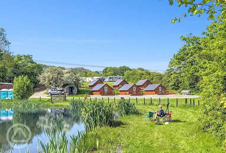 Glamping lodges around the onsite fishing pool (extra cost)