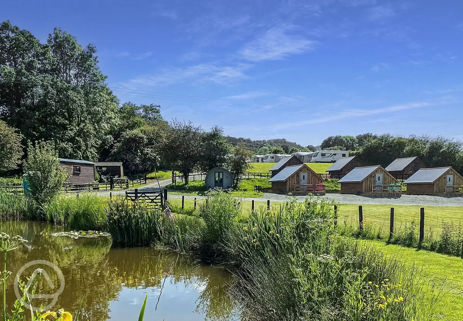 Glamping lodges around the the onsite fishing pool (extra cost)