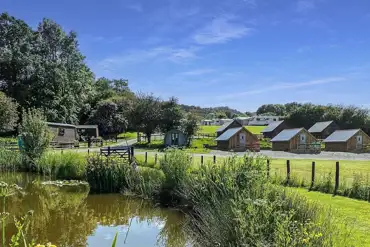 Glamping lodges around the river