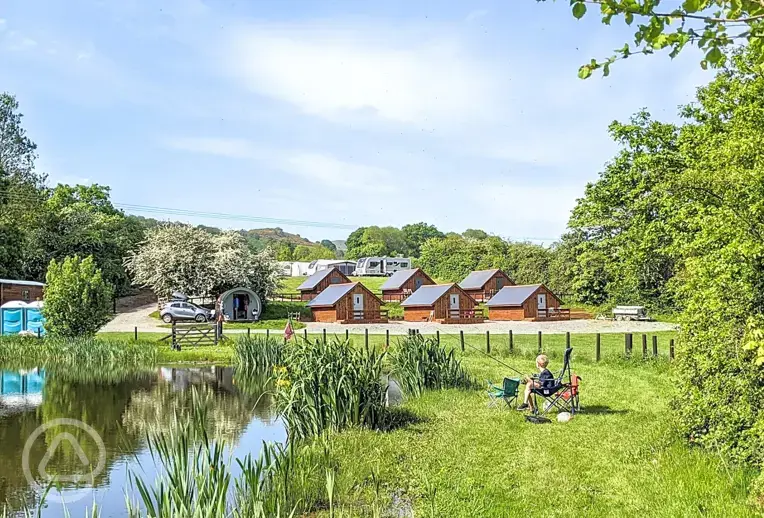 Glamping lodges around the onsite fishing pool (extra cost)