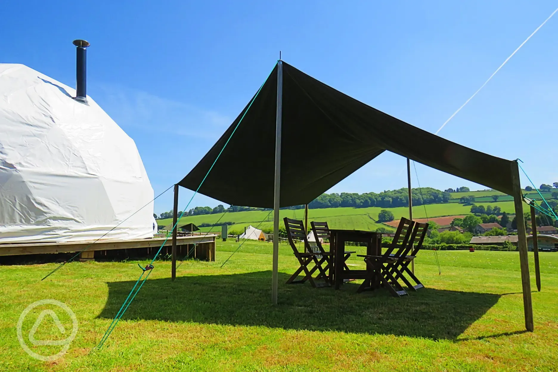 Dome Osprey covered outdoor dining area