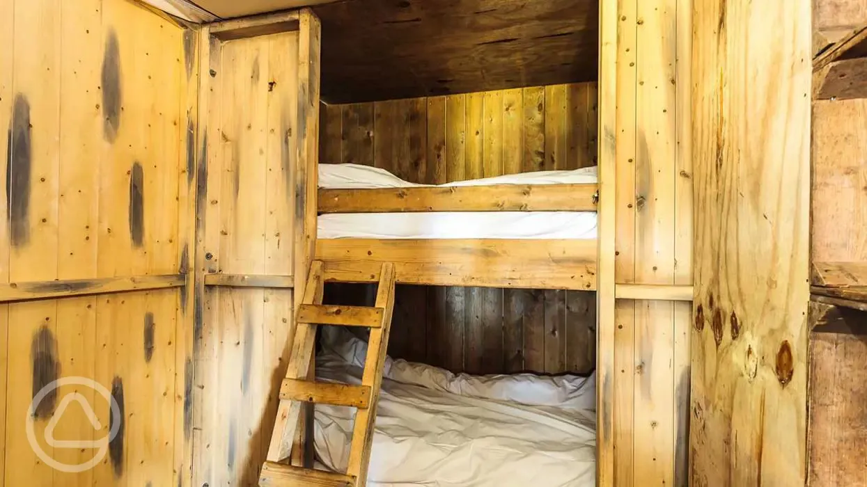 Bunk beds in the canvas lodges