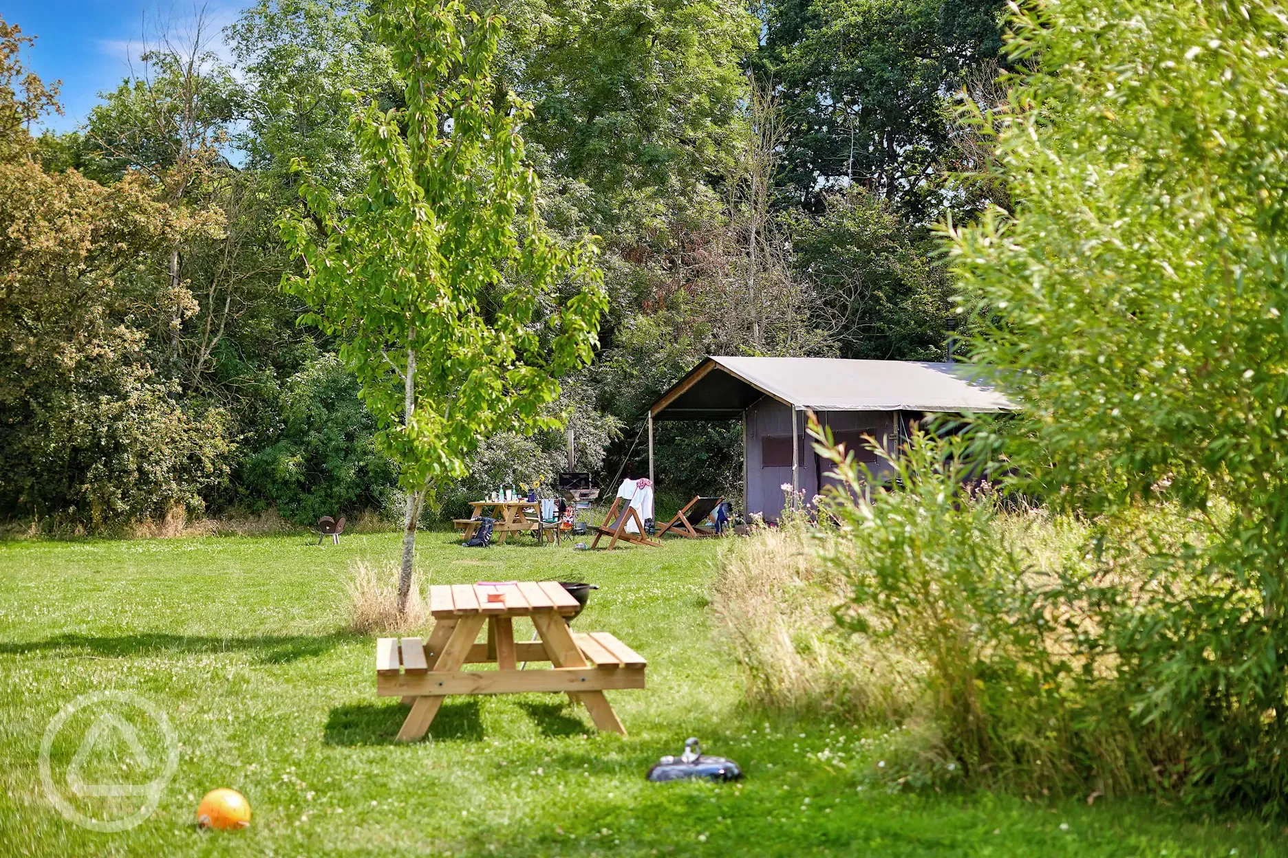 Canvas lodge outdoor seating area