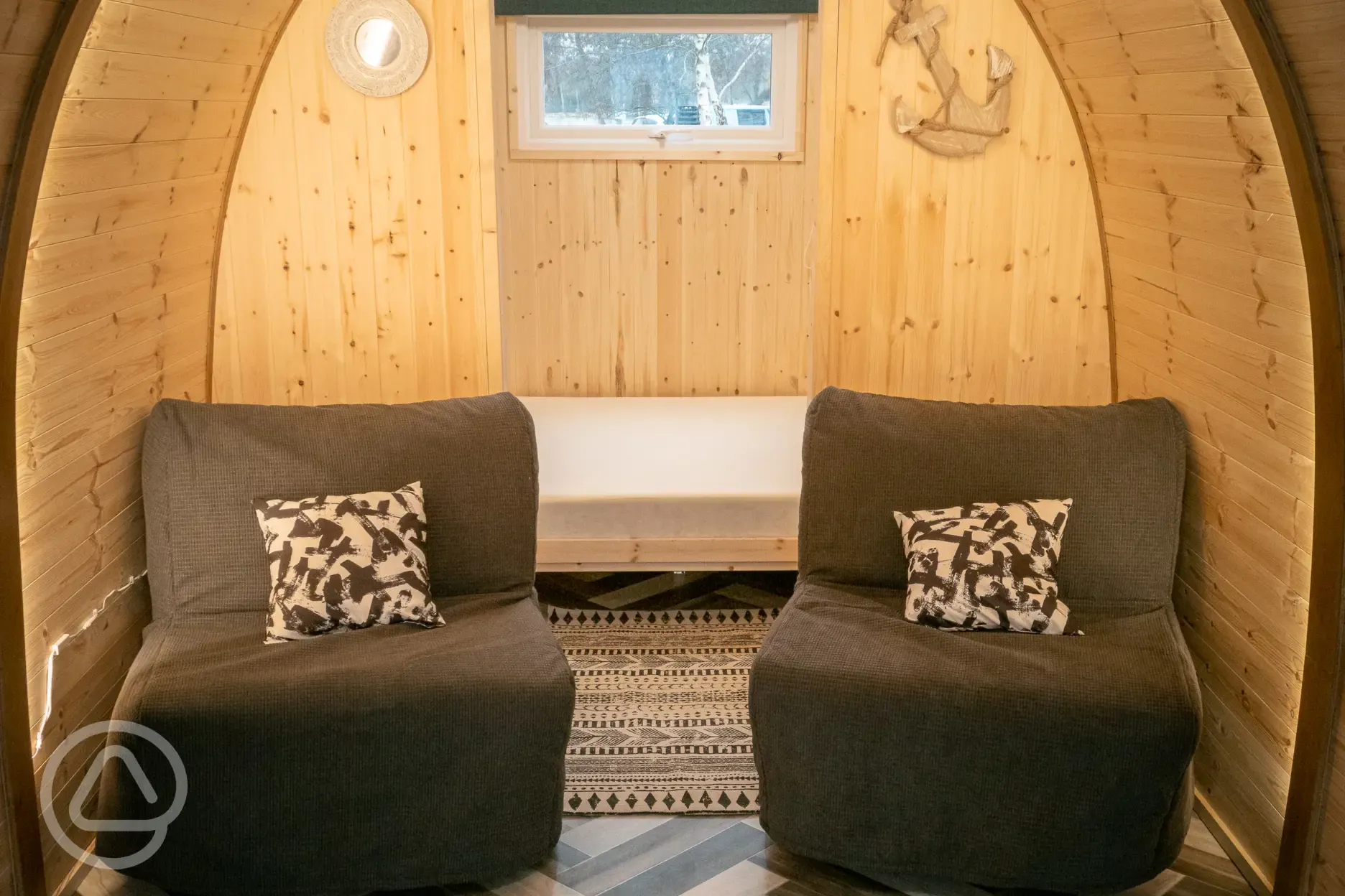 Family camping pods with a double bed and two foldaway beds
