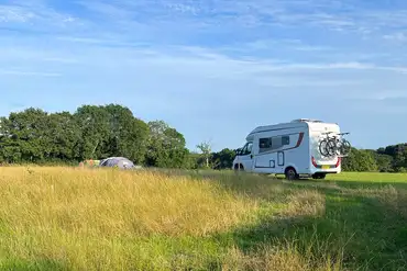 Grass pitches for tents, roof tents, and campervans