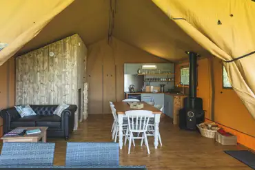 Interior of safari tents - kitchen, dining and living area