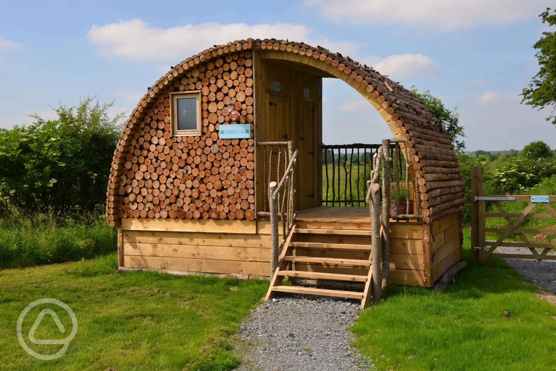 Log pod toilets and showers