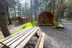 Picnic bench outside a camping pod
