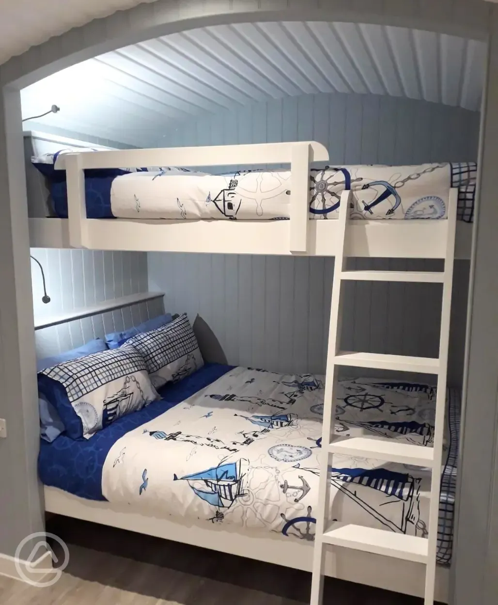 Shepherd's hut king size bunk beds