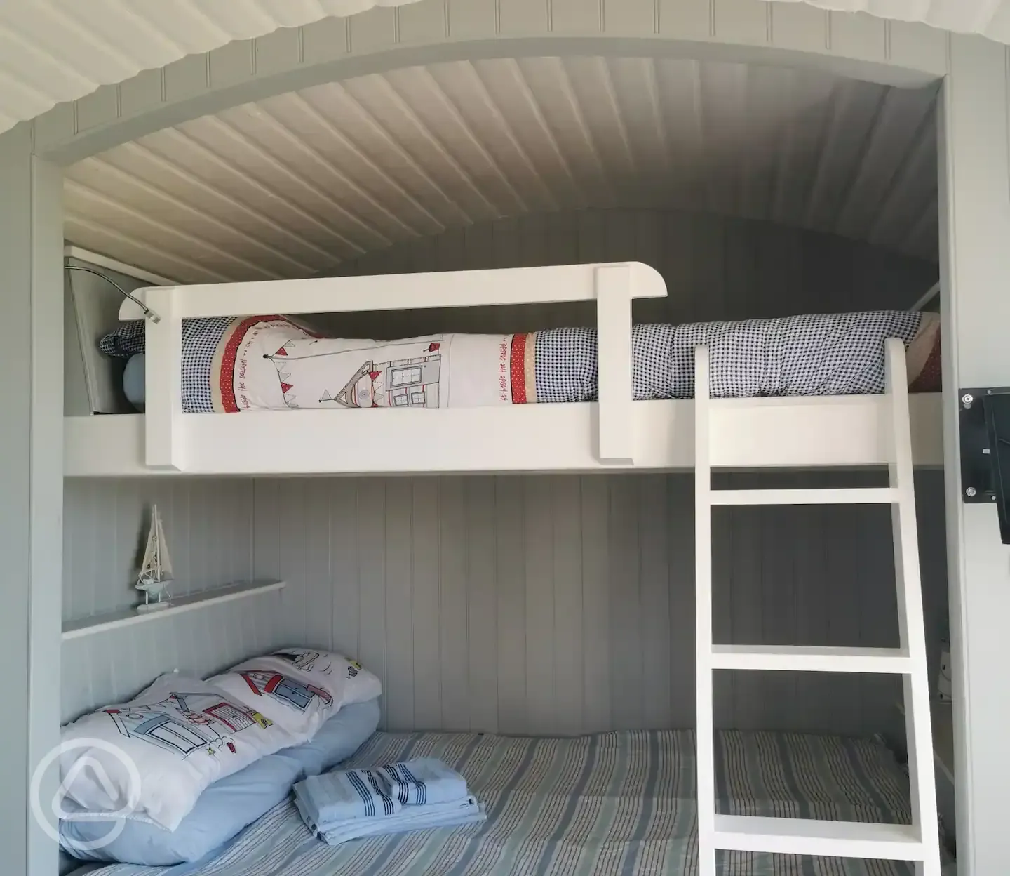 Shepherd's hut king size bunk beds