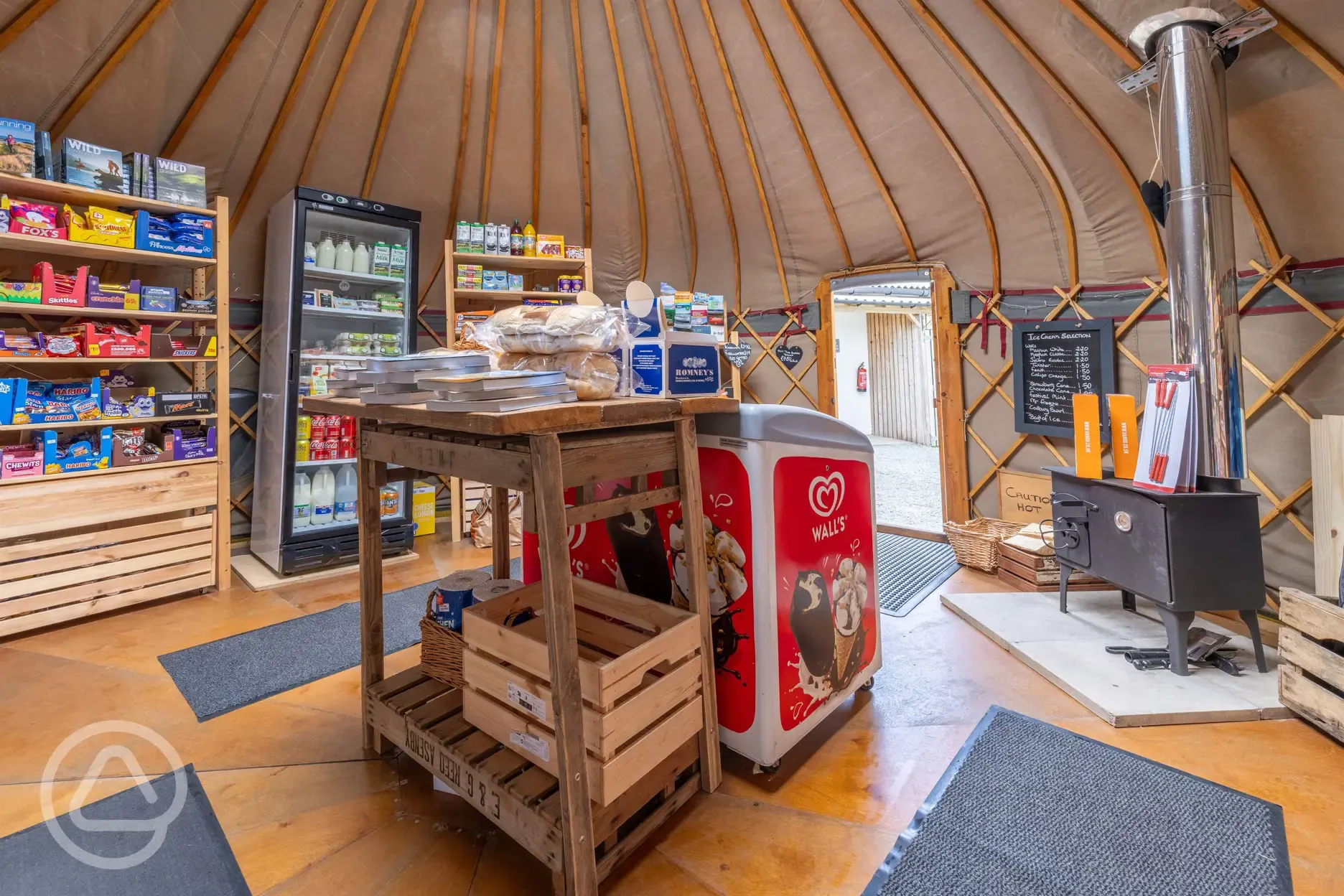 Shop and reception, selling essentials, ice creams, coffee, bread and pastries