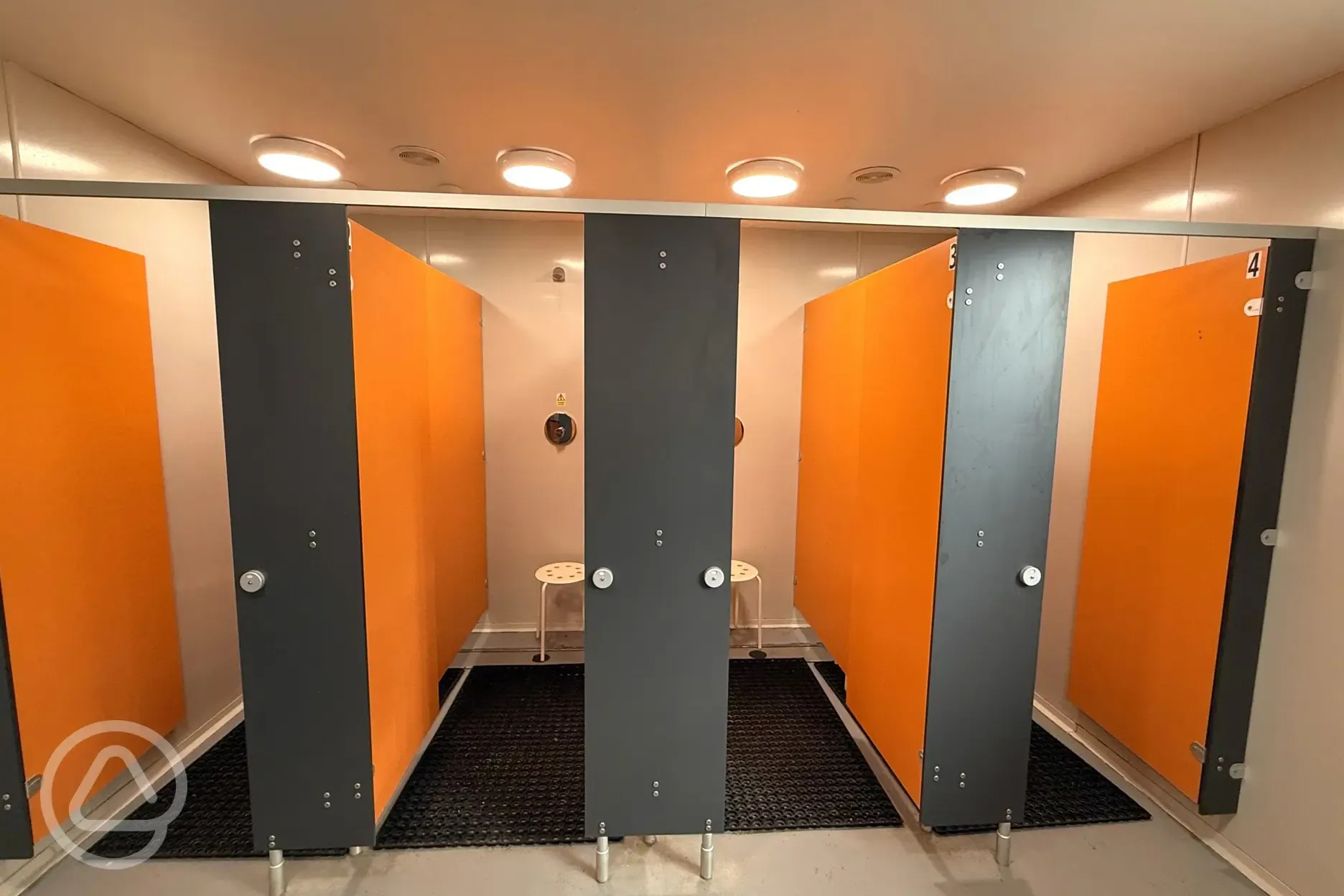 Showers with stools and hooks