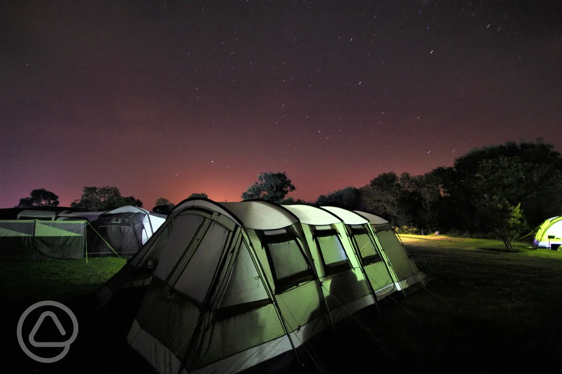 Electric grass pitches at night