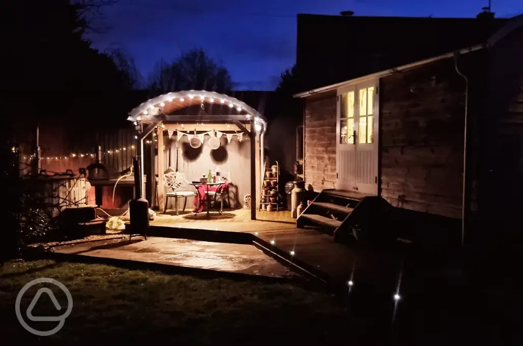 Ensuite shepherd's hut at night