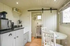 Shepherd's hut kitchen at Hay and Hedgerow Glamping