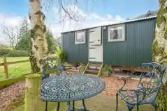 Shepherd's hut at Hay and Hedgerow Glamping