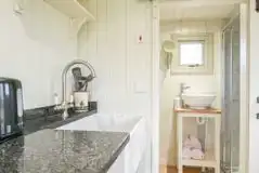 Shepherd's hut - kitchen and bathroom