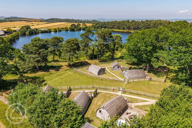 Aerial of Langley Dam Glamping with waterside views