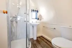 Blackcleugh ensuite with a toilet, shower, sink and shaver socket Blackcleugh ensuite with a toilet, shower, sink and shaver socket