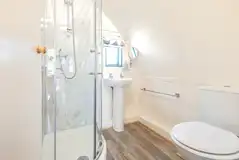 The Wonneys ensuite with a toilet, shower, sink and shaver socket The Wonneys ensuite with a toilet, shower, sink and shaver socket