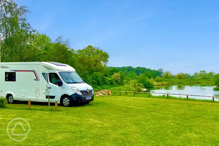 Lakeside electric grass touring pitches at Stanton Lakes