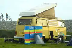 Small VW campervan on a non electric grass pitch Small VW campervan on a non electric grass pitch