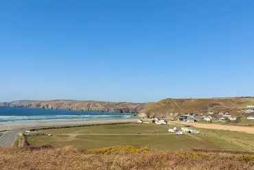 Overview of tourers on the grass pitches at Newgale Campsite 