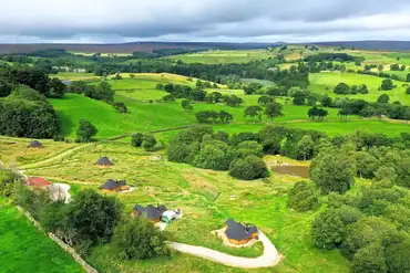 Aerial of Little Seed Field amongst woodland, ponds and countryside