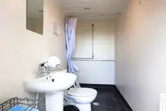 Onsite shared washroom facilities for standard glamping cabins Onsite shared washroom facilities for standard glamping cabins