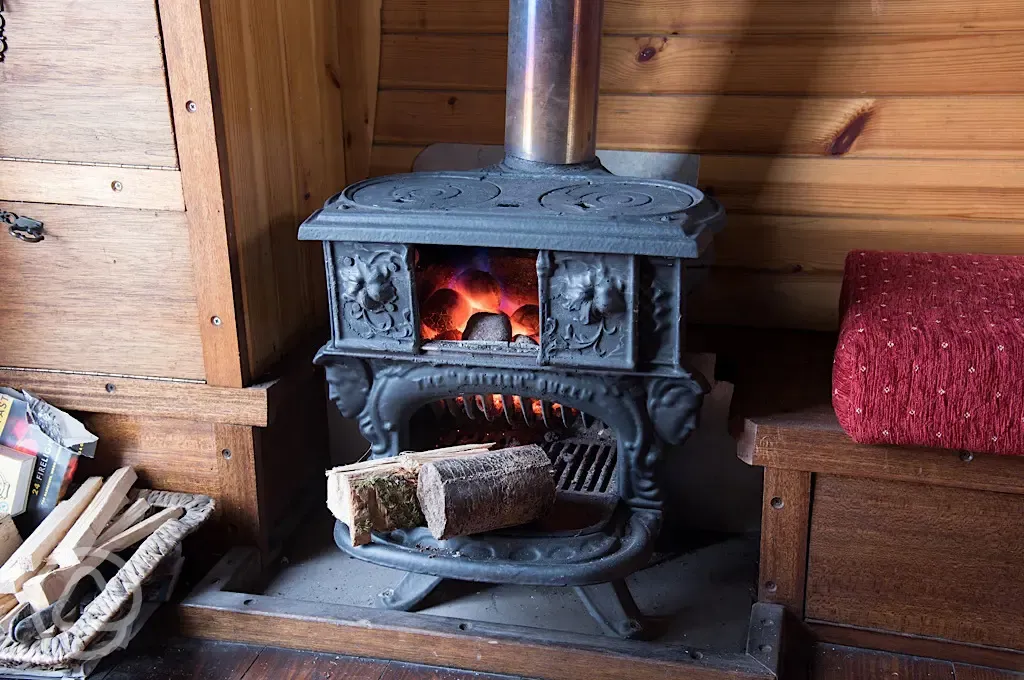 Bow top gypsy caravan wood burner