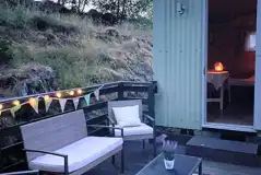 Shepherd's hut decking and outdoor seating