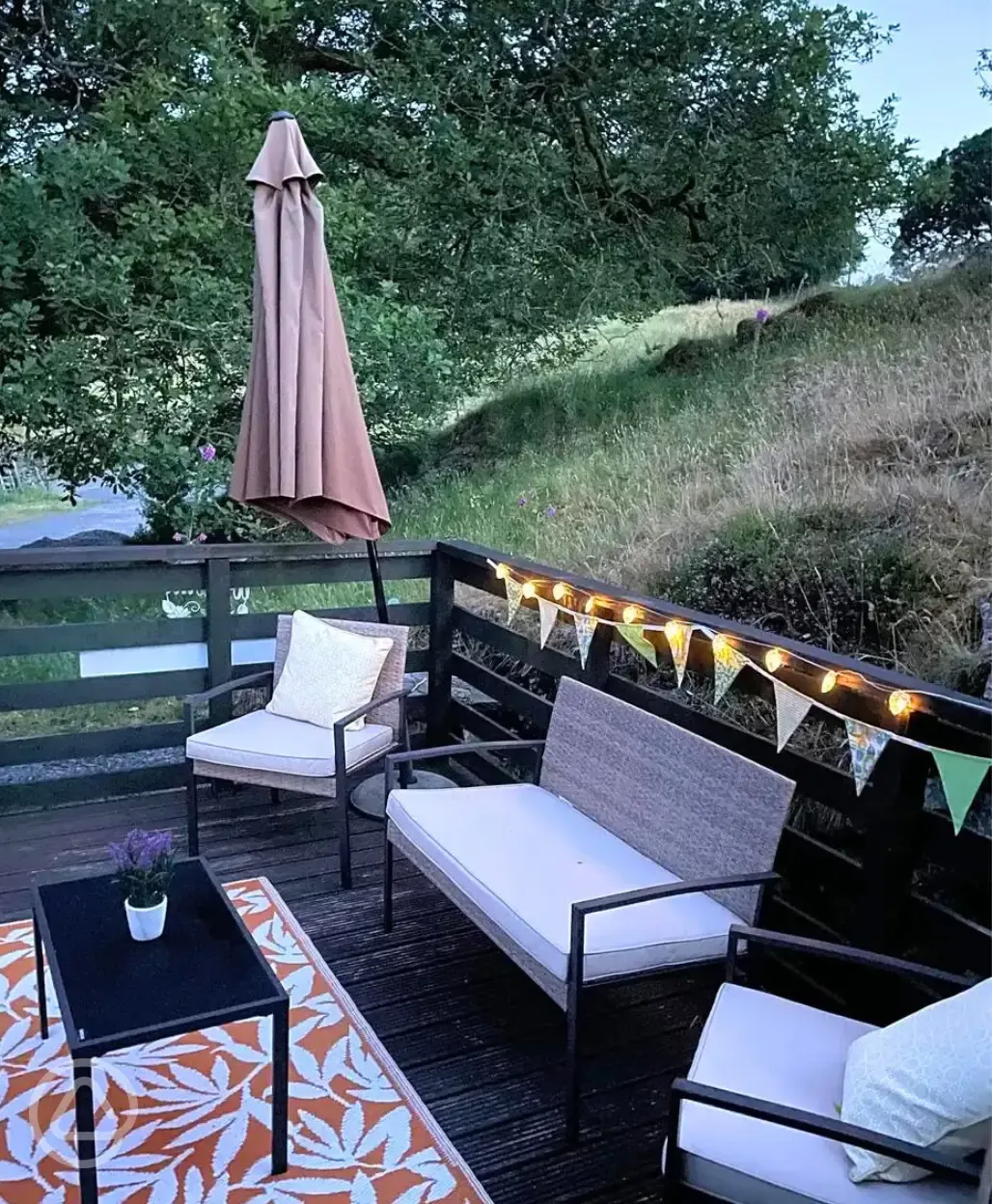 Shepherd's hut decking and outdoor seating