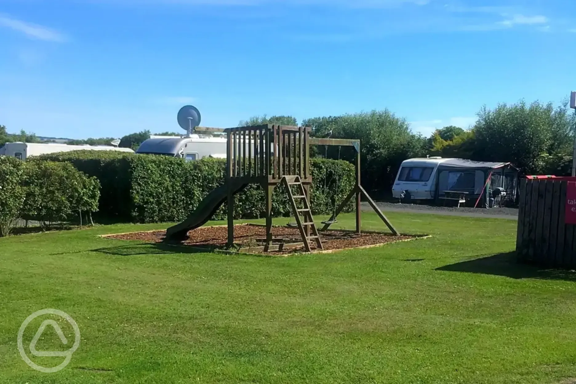 Childrens play area beside the electric hardstanding super pitches