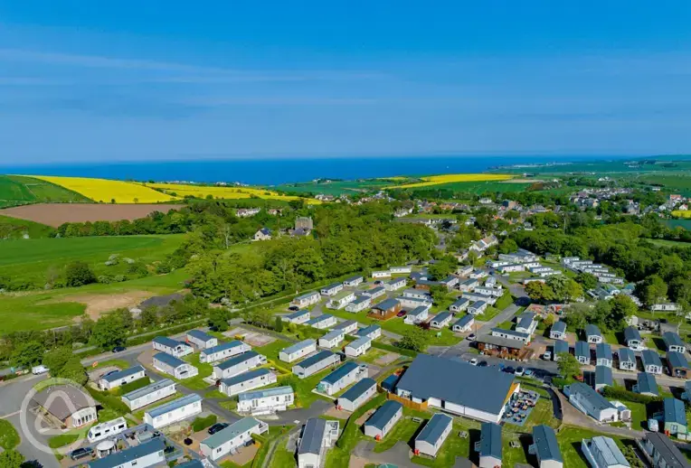Aerial view of Coldingham Bay with distant sea views