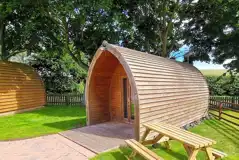 Camping pod with a private outdoor picnic bench Camping pod with a private outdoor picnic bench