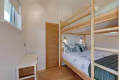 Family shepherds cabin bedroom