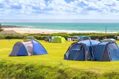 Grass pitches with sea views over Croyde Bay at Ruda Holiday Park