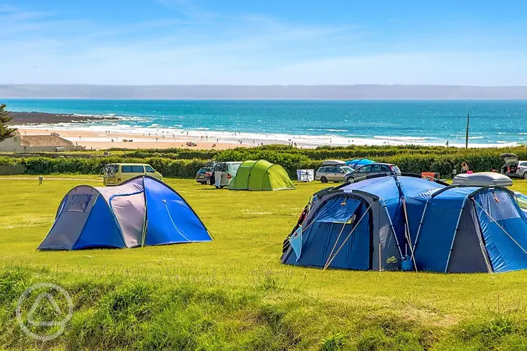 Grass pitches with sea views over Croyde Bay at Ruda Holiday Park
