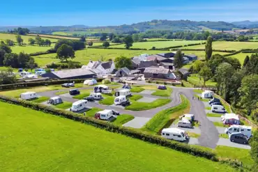 Aerial of Bryndu Caravan and Camping and neighbouring farm buildings