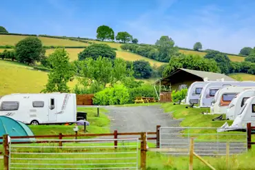 Hardstanding pitches with optional electric and a glamping safari tent