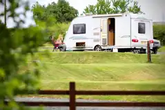 Hardstanding pitches on tiered levels with optional 16 amp electric