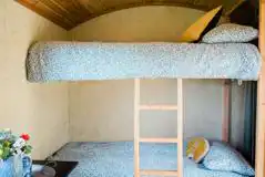 Single bunk bed in the Beacon shepherd's hut