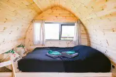 Pod interior with a double bed (bedding and towels included)