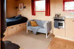 No 2 Allotment shepherd's hut interior with a double bed