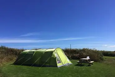 Tent in sunshine on the Pembrokeshire Coast