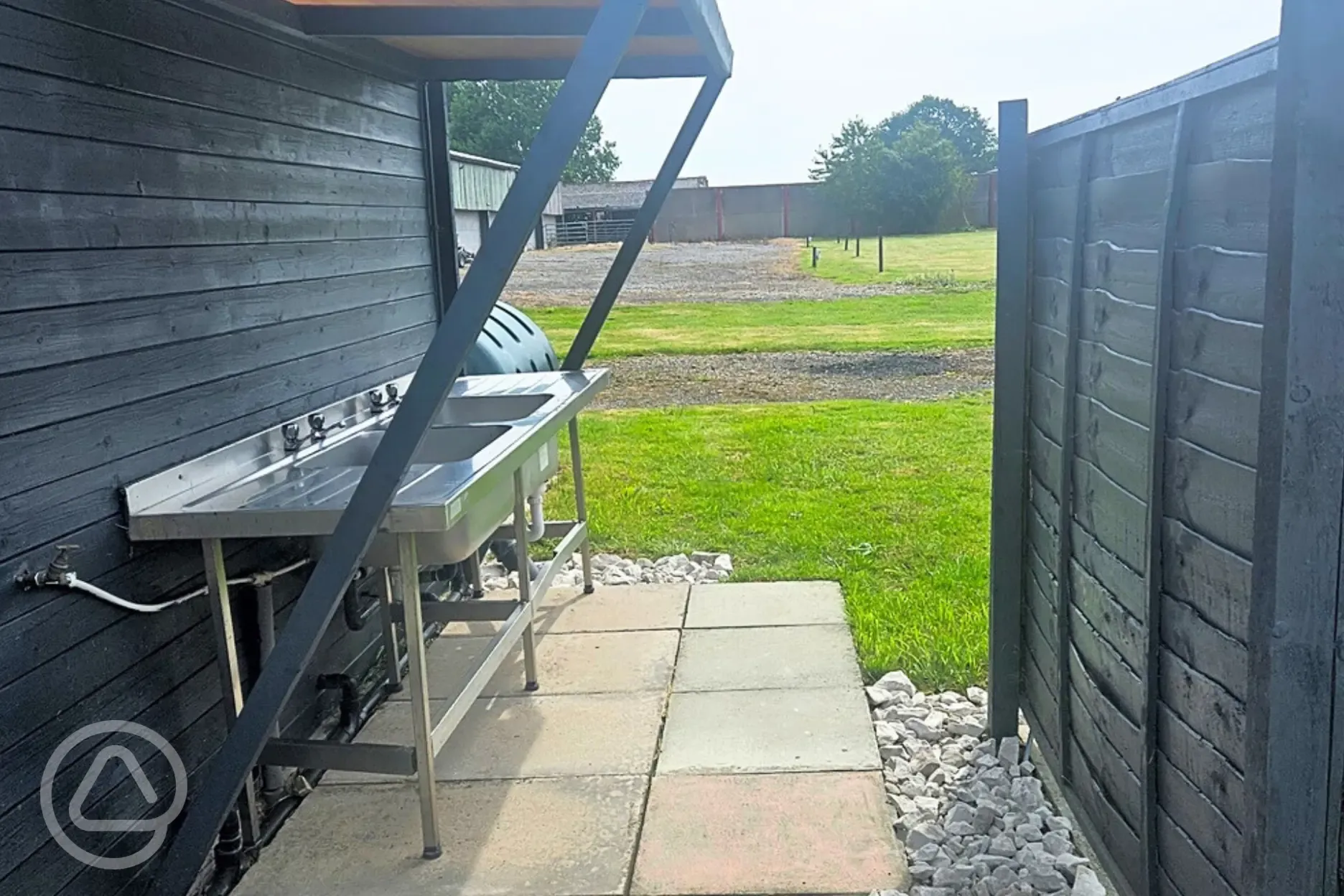 Outdoor sheltered washing up area