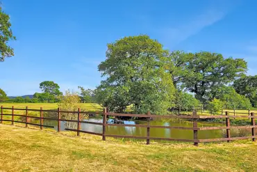 Fenced wildlife pond