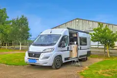 Motorhome on Fox electric hardstanding and grass touring pitches Motorhome on Fox electric hardstanding and grass touring pitches