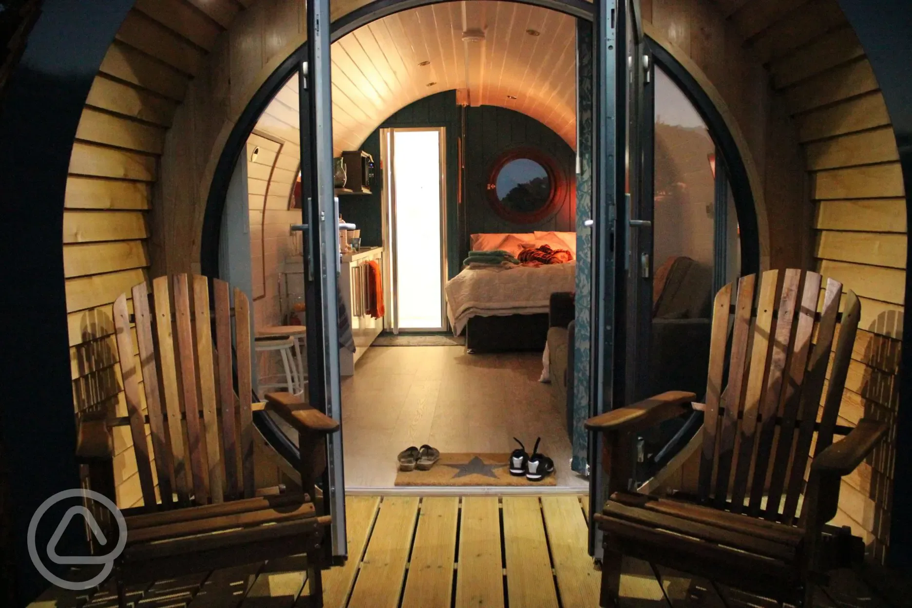 Looking through the doors into the glamping pod at Stackpole